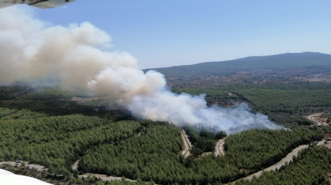 Ege nin tatil cennetinde korkutan yangın: İzmir den helikopter desteği!