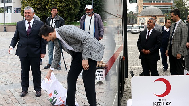 İzmir de MHP liler sokak hayvanlarına yem bırakıp kan bağışında bulundu