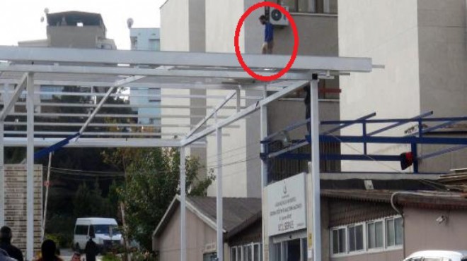 İzmir de o hastaneye giden donup kalıyor... Bu işçi ne yapıyor?