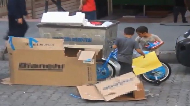 Kağıt toplayan kardeşlerin hayalindeki bisiklet, konteynerden çıktı