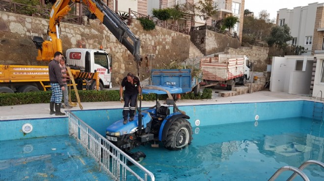 Muğla da ilginç kaza: Havuzda traktör var!