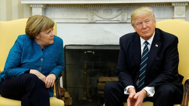 Trump Merkel in elini neden sıkmadığını açıkladı!