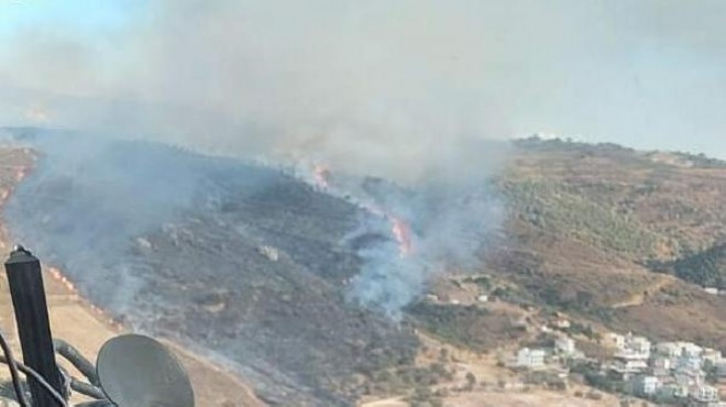 İzmir de makilik alanda yangına havadan müdahale